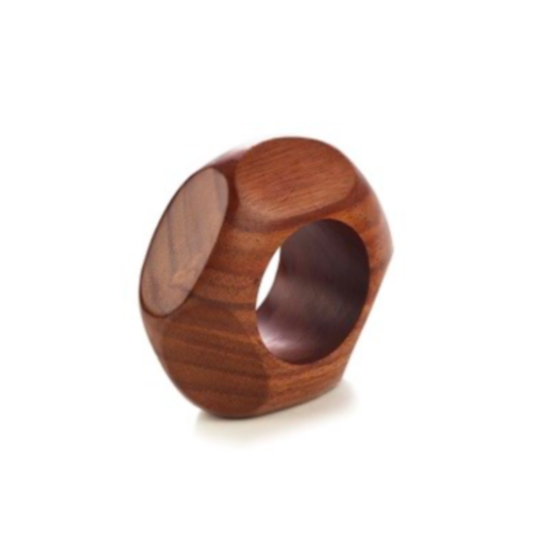 The Alexis Teak Napkin Ring Set of 4 by Bodrum features chunky, geometric wooden rings with smooth flat and rounded surfaces, making them perfect accents for your table. Shown against a white background.