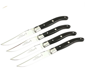 The Claude Dozorme Laguiole Steak Knives Set of 4 features polished steel blades and dark wood handles, arranged diagonally on a white background to highlight the elegance of classic French cutlery.