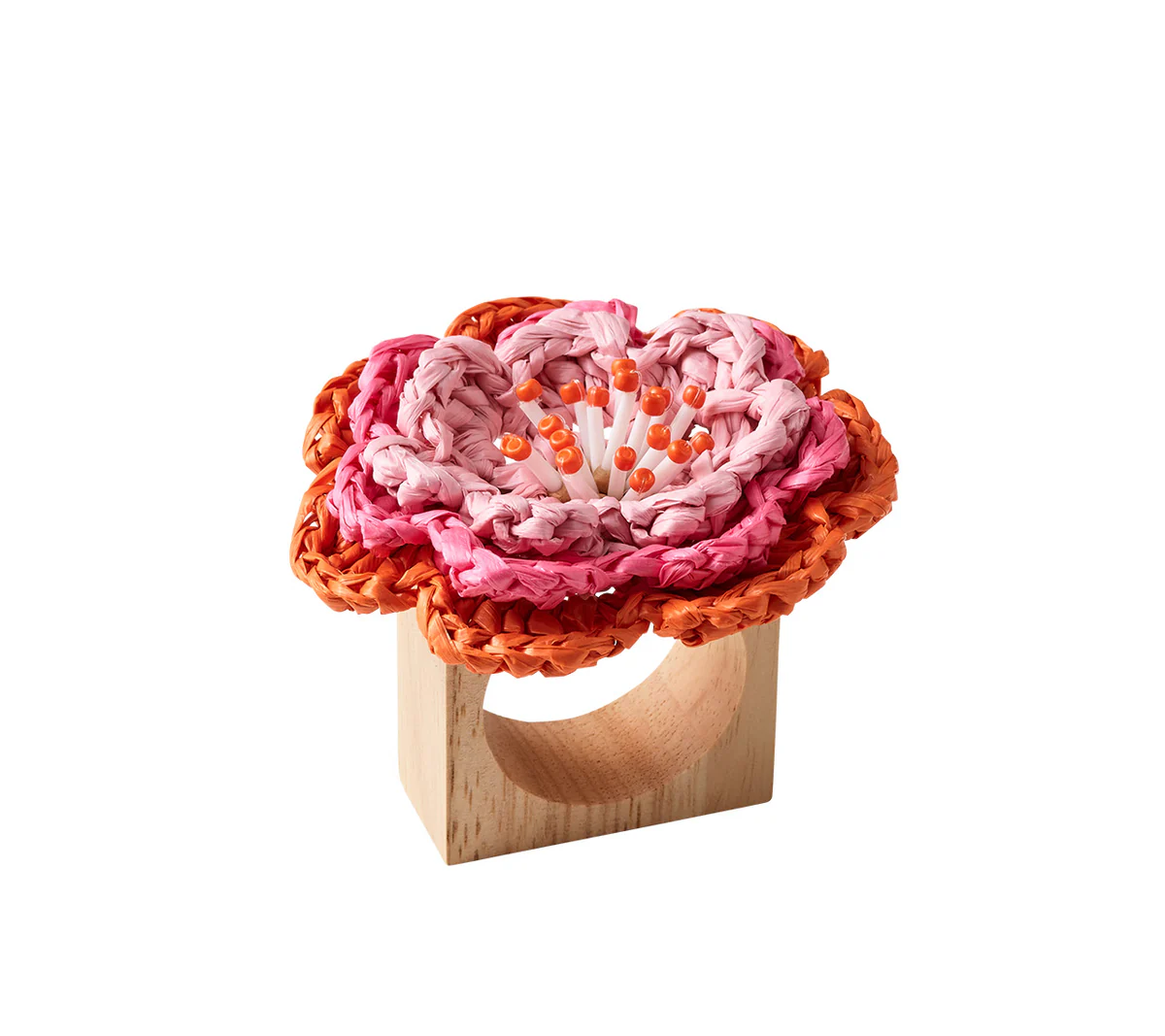 The Kim Seybert Pareo Napkin Ring Set of 4 features wooden rings topped with large woven flowers in pink and orange, accented by matching bead details at the center.