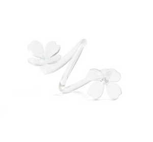A silver ring featuring two delicate white flower designs at each end, with five petals on each flower, set against a plain white background—perfect for those who appreciate decorative tableware that brings an elegant touch to any setting.