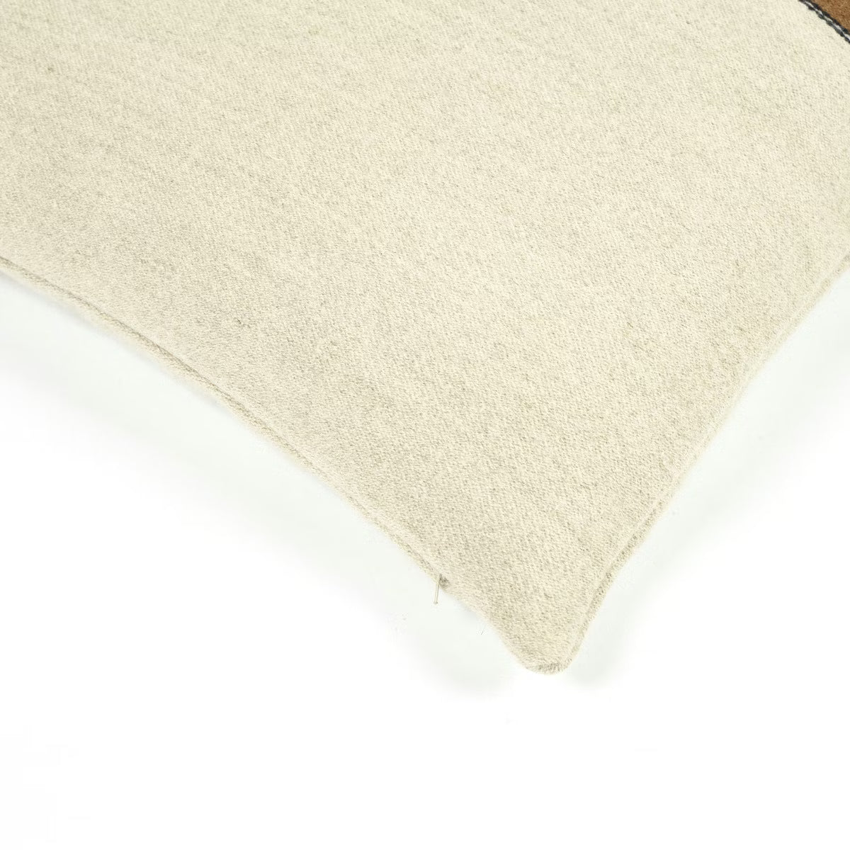 A close-up of the Libeco Home Gus Stripe Pillow 25 x 25 in beige linen wool, set against a white background and highlighting its corner and textured material.