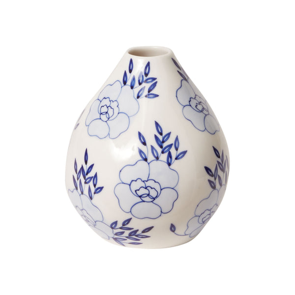 The Leonore Bud Vase by Accent Decor is a white ceramic vase with a rounded shape, blue floral and leafy patterns, a small top opening, and a glossy finish.