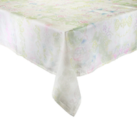 A close-up of a rectangular table draped with the Kim Seybert Giverny Tablecloth in Mint & Multi, a light linen featuring a pastel floral pattern in pink, green, and blue hues. The tablecloth falls gracefully over the edges.