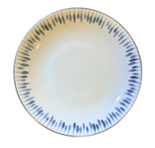 The Marie Daâge Allee de Cypres 3 Platinum Rim Dinnerware is a round ceramic plate with a white center and blue leaf-like border, hand-painted for a simple, modern look that elevates any table setting.