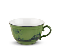 Ginori 1735 Oriente Italiano Dinnerware Malachite tea cup featuring a white interior and dark green painted floral and landscape motifs.