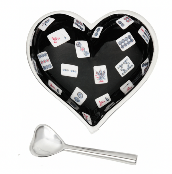 The Happy Heart Bowl With Spoon - Mah Jong by Inspired Generations is a heart-shaped bowl with a black interior and mahjong tile pattern, paired with a small silver heart-shaped spoon.