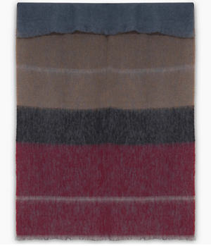 The Boher Extra Large Throw is a hand-finished luxury mohair blanket featuring soft-textured, wide horizontal stripes in shades of blue, brown, dark gray, and deep red.