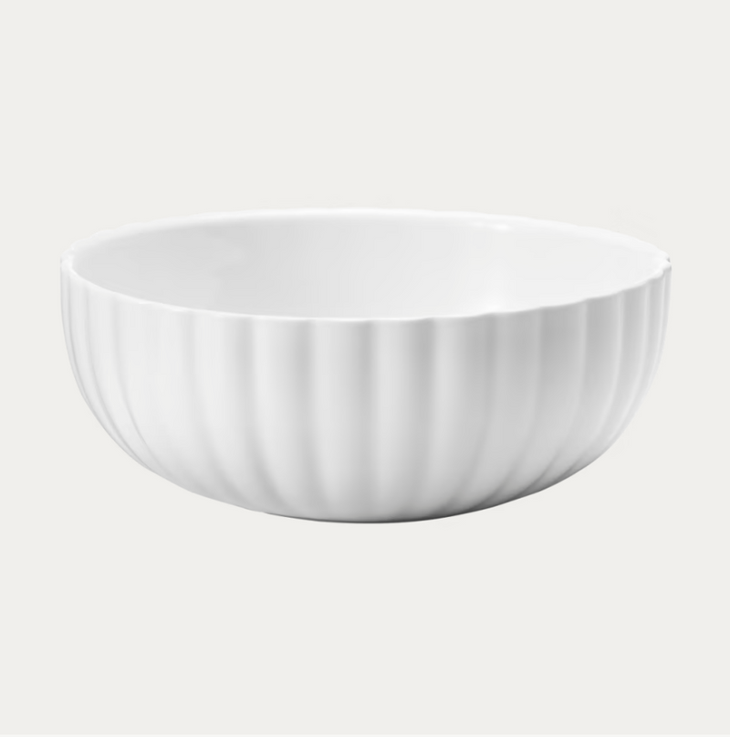 A white, round ceramic bowl with a fluted stripe design from the Bernadotte Dinnerware collection by Georg Jensen, shown against a plain light background.