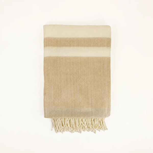 Folded Kallpa Collection Alpaca Throw - Tobacco & Wheat with cream and tan horizontal stripes and fringe on one end.