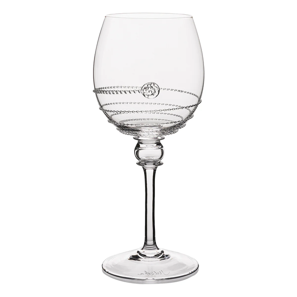 The Amalia Glassware by Juliska features clear glass wine glasses with a decorative chain-like rim and embossed bowl detail—handmade to highlight Juliska's Bohemian glass artistry.
