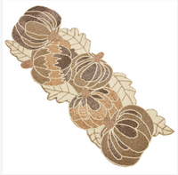 Saro Trading Beaded Pumpkin Runner - Gold featuring a repeating harvest-inspired centerpiece pattern of beaded pumpkins and leaves in shades of gold and brown, perfect for autumn table decor.