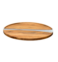 The BT-Shalom Resin and Wood Challah Board features a round wooden design with a clear resin inlay running across the diameter, making it an elegant addition to your Shabbos table. Displayed on a white background.