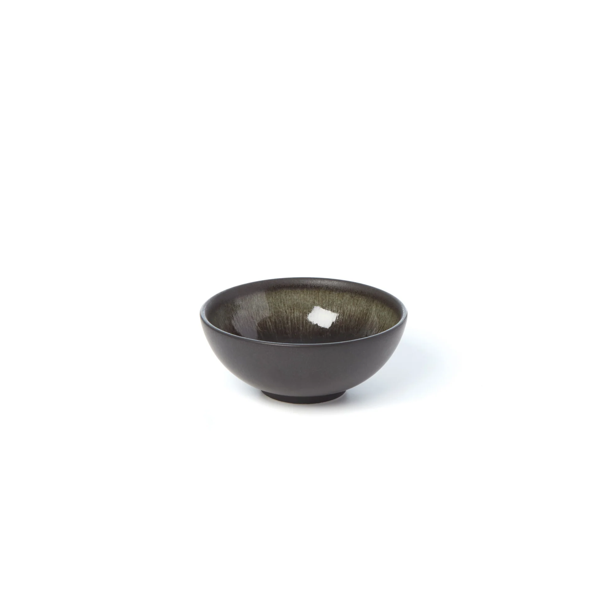 The Tourron Samoa bowl by Jars - Rosenthal is a small, round, dark ceramic with a glossy interior and short base—an elegant match for any artisan stoneware plate.