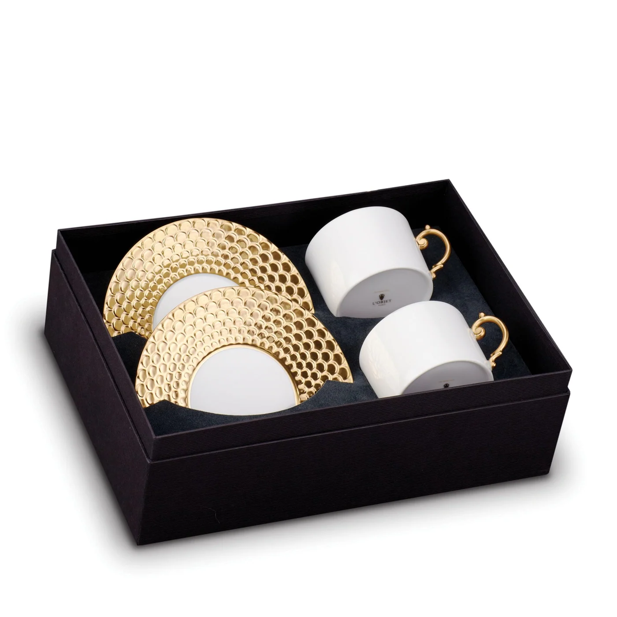 Aegean Gold - Tea Cup and Saucer (Set of 2) featuring two porcelain tea cups with 24k gold handles and matching saucers with a gold honeycomb pattern, presented in a luxury gift box.