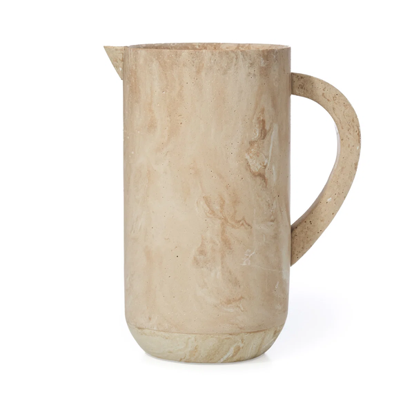 The Soleil Resin Pitcher - Sand by Godinger features a curved handle and small spout, showcasing natural stone patterns in a beige tone with a durable design, all set against a plain white background.