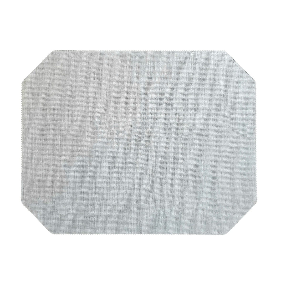 A rectangular light gray placemat from Julian Mejia’s Bespoke Double Sided Emerald Cut Rectangle set features slightly rounded, clipped corners and a subtle textured pattern.