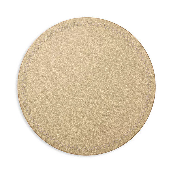 A set of four round, beige leather Starry Night Placemats by Kim Seybert, featuring subtle edge stitching and an easy-to-clean design, displayed against a white background.