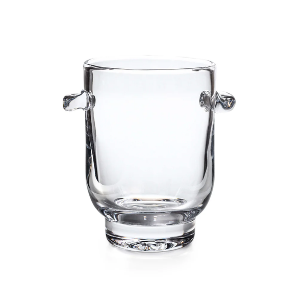 The Simon Pearce Manchester Ice Bucket is crafted from clear glass with two small, rounded handles on opposite sides, shown against a white background.