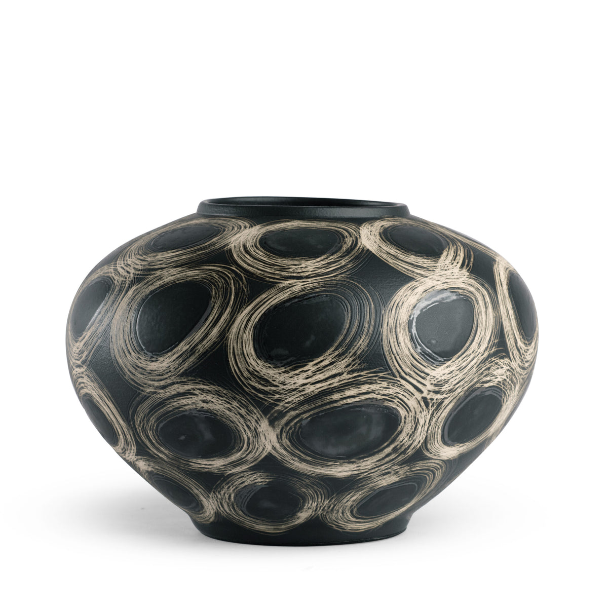 The Wren Vase - Black by FlowDecor Inc. is a round black ceramic vase with a narrow opening, featuring bold swirling cream circles—an eye-catching accent for any decor.