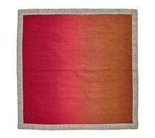 The Kim Seybert Dip Dye Napkins - Earthtones (Set of 4) feature a square linen design with a gradient from deep red to orange and an elegant metallic foil border.