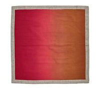 The Kim Seybert Dip Dye Napkins - Earthtones (Set of 4) feature a square linen design with a gradient from deep red to orange and an elegant metallic foil border.