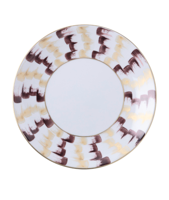 The Marie Daâge Zephyr 1 Dinnerware by Marie Daâge is a round porcelain plate with a wide rim, hand-painted in alternating brown, beige, and gold brushstrokes on white. The center of the plate is plain white.