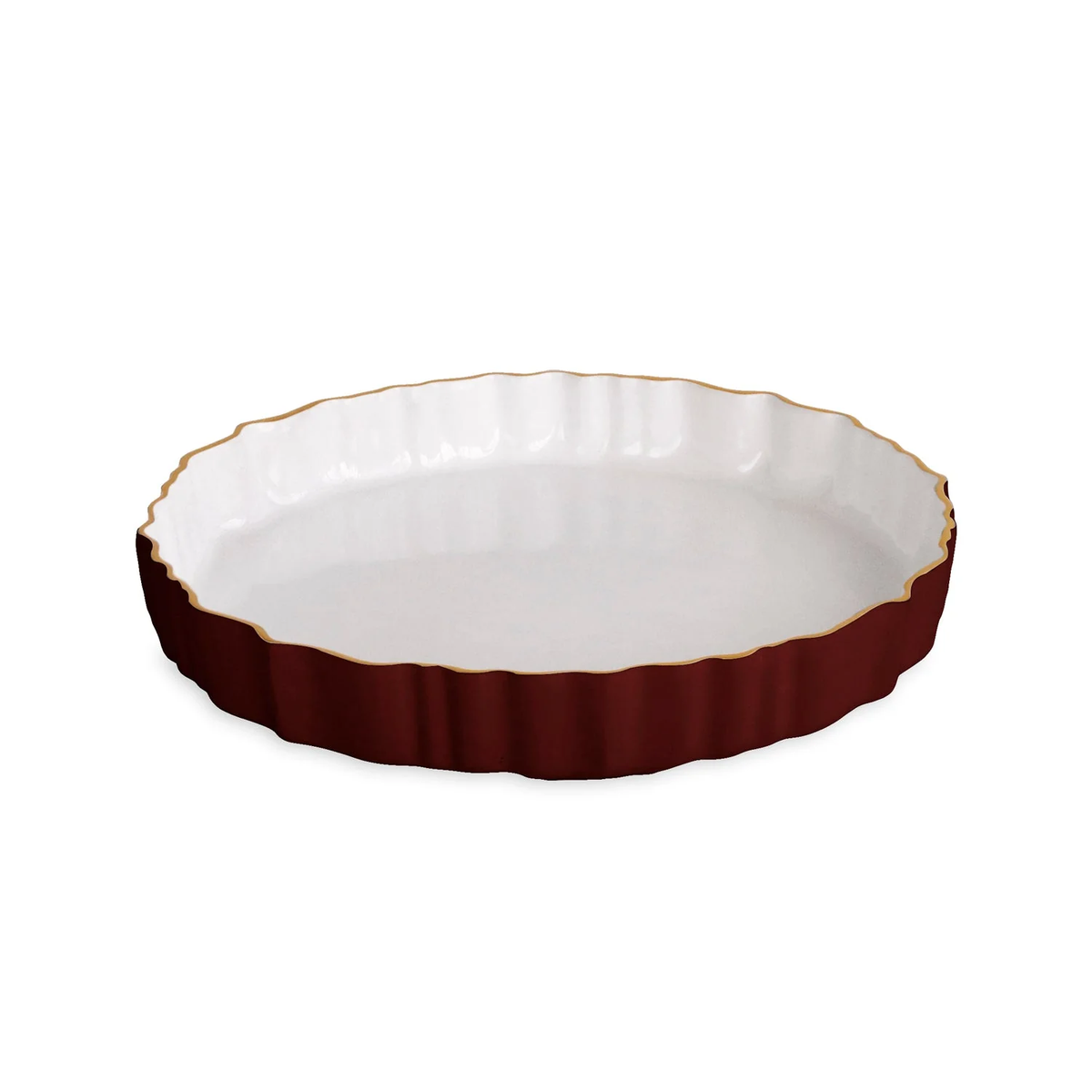 Inspired by vintage fluted round tray designs, the Beatriz Ball Encanto Vintage Fluted Round Tray in Bordeaux & White features a scalloped edge, a white interior, and a deep red exterior finished with a delicate gold rim.