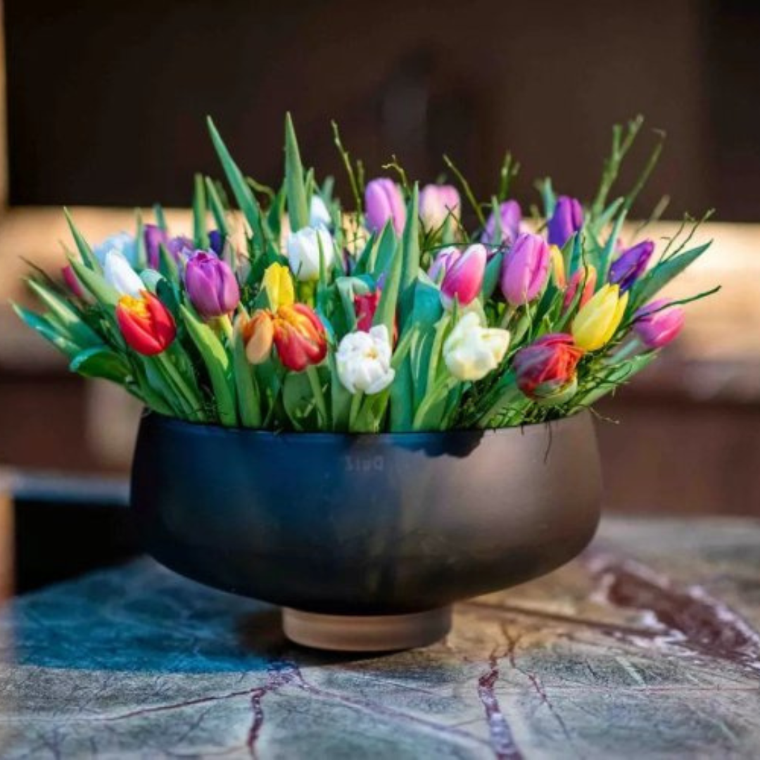 Matte Topaz Rieky Bowl - Large with tulips inside. 