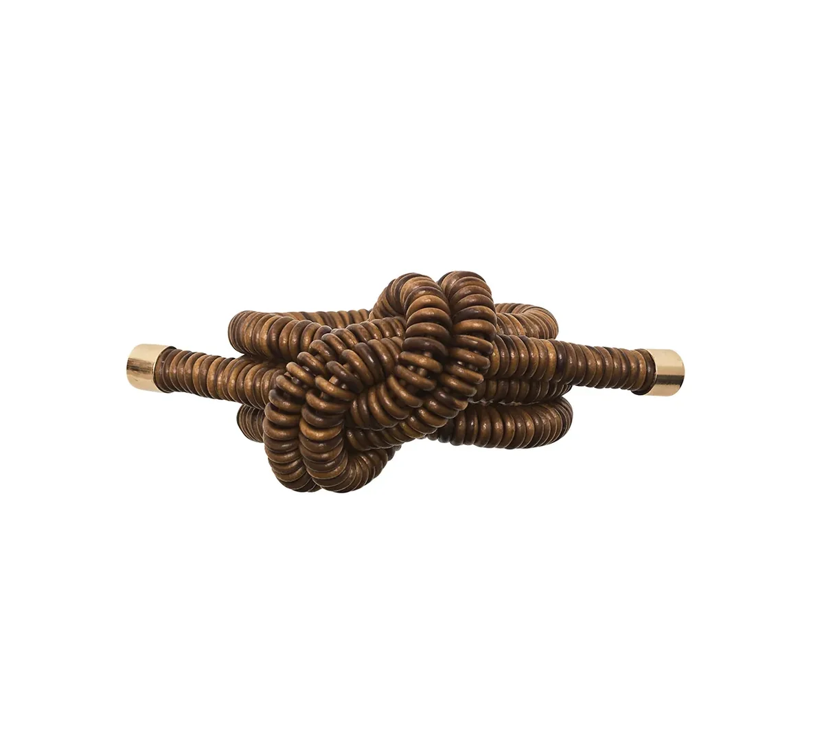 The Coil Napkin Ring Brown by Kim Seybert features coiled bronze-colored rings with smooth, cylindrical ends, creating a metallic knot-like design; shown here against a plain white background.
