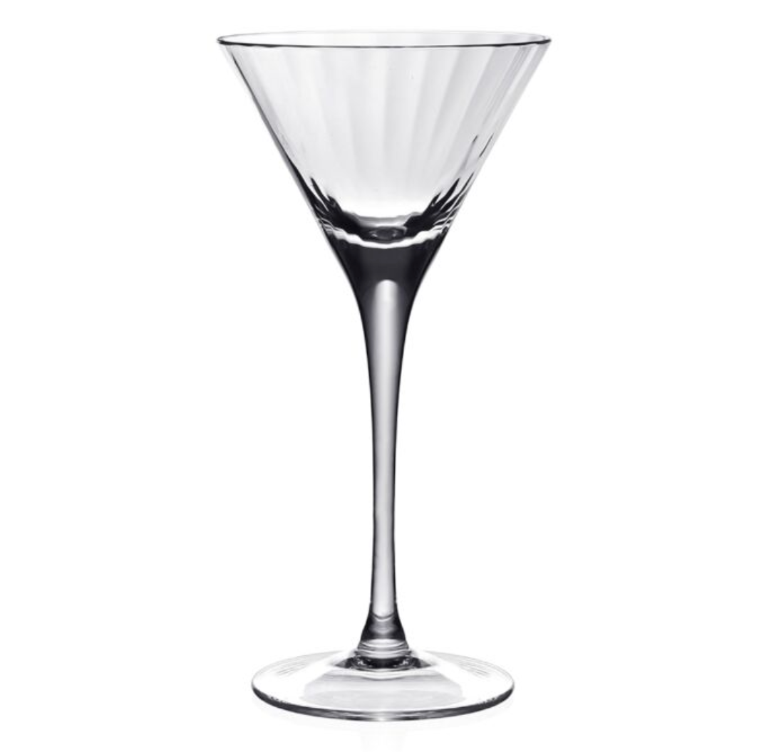The Corinne Drinkware by William Yeoward features a clear martini glass with a wide conical bowl, long stem, and round base, reflecting modern barware style against a plain white background.