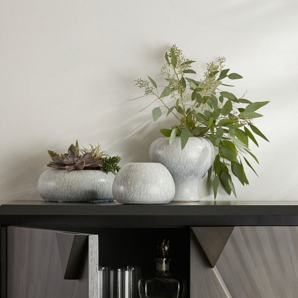 The Dandy Vases Set of 3 - Grey by Arteriors features light gray ceramic vases with an icy morn finish—ideal for displaying foliage or succulents and bringing spa-like serenity to your space.