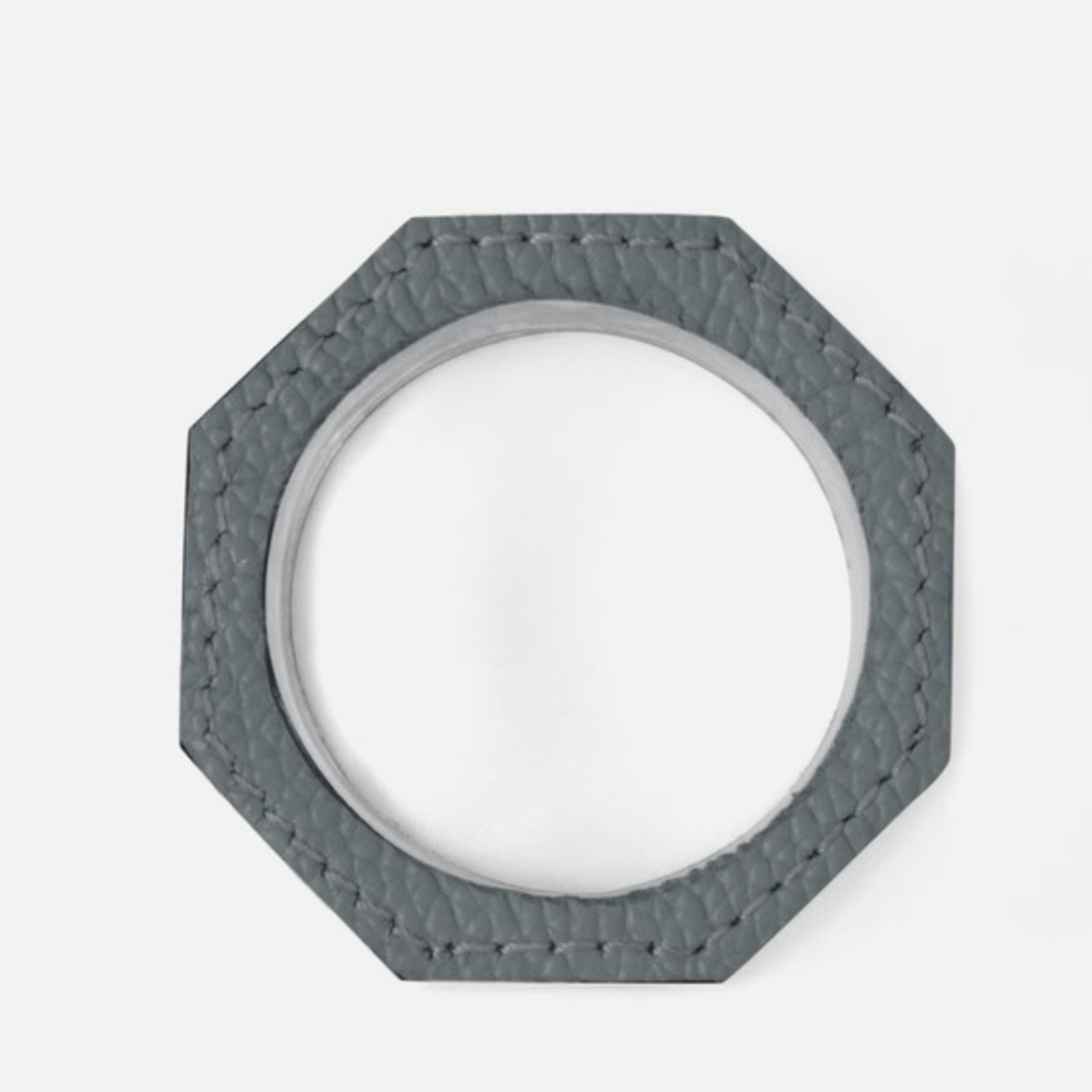 The Arthur Napkin Rings Set of 4 by Blue Pheasant features dark grey, octagonal rings crafted from full-grain leather with visible stitching, displayed against a plain white background.