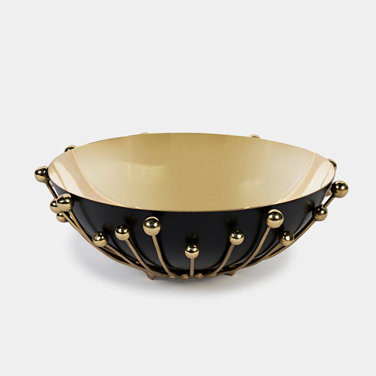 The Luho Eden Bowl features a matte black exterior, a glossy gold interior, and gold rod and sphere accents for an elegant, modern look. This food-safe accessory combines sophistication with contemporary style.