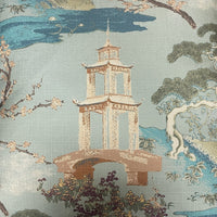 The Zen Pillow Seaspray 22 x 22 by Decor Fifty-Five features an Asian-inspired design with an embroidered pagoda, blooming trees, water, and landscape in blue, green, and beige linen.