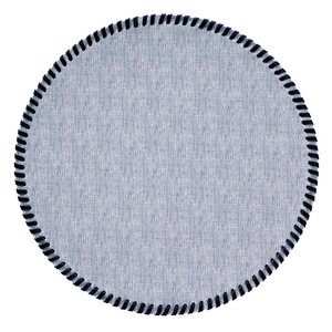 A round, light blue Bodrum Whipstich Round Placemat with a dark blue whipstitch edge.