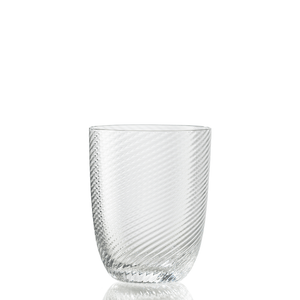 The Idra Tumbler Torse by Nason Moretti is a clear glass tumbler featuring a subtle diagonal textured pattern, presented against a plain white background.