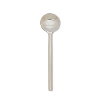 The Modern Spoon Small by Abbott Collection features a shiny stainless steel finish, round bowl, and straight handle, perfectly capturing modern minimalism against a plain white background.