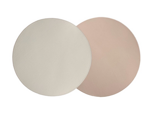 Two Grained Faux Leather Reversible Placemats by Von Gern Home—one in beige, one in blush pink—overlap slightly to create an elegant table setting against a crisp white background. Set of 4.