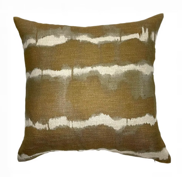 The Decorum Baturi Linen Pillow Truffle 23 x 23 features a brown background with white, wavy horizontal stripes for a tie-dye effect. Its dyed linen texture adds depth and style to any space.