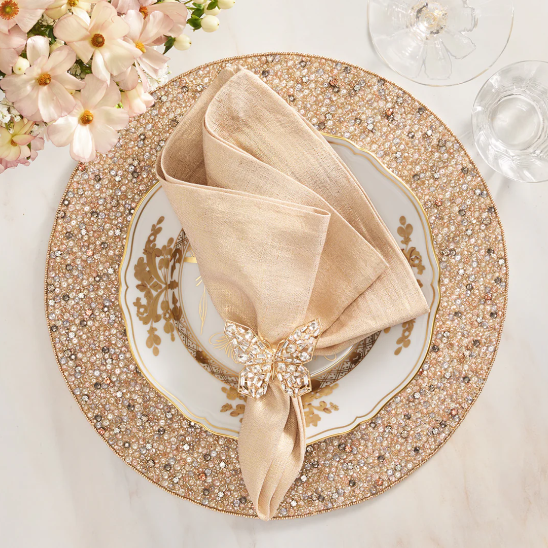 Papillion napkin ring displayed on a holiday table. 