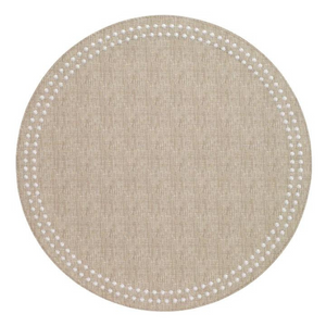 The Bodrum Pearls Round Placemat Set of 4 in beige features a subtle fabric texture and white dotted border near the edge, crafted from phthalate-free vinyl for safe, stylish dining.