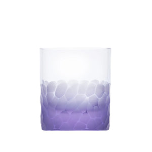 The Pebbles DOF 370 ml by Moser is a hand-blown, lead-free Czech crystal whisky tumbler featuring a textured frosted gradient in light purple on the lower half and a smooth, transparent upper half.