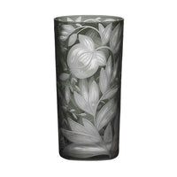 Tall grey Artel Verdure Highball Jewel Colors crystal glass tumbler etched with a pattern of leaves and fruit.