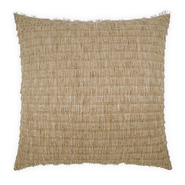 Textured beige pillow on a white background