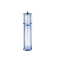 The Addison Ross Flute Salt & Pepper Shaker is a clear, cylindrical shaker with a blue tint, faceted design, small metallic top knob, and durable ceramic mechanism, shown standing upright against a white background.