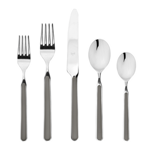 The Mepra Fantasia Flatware 5 Piece Set, available in 16 colors, features two forks, a knife, a tablespoon, and a teaspoon displayed in a row on a white background.