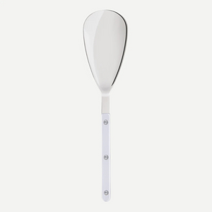 The Sabre Bistrot Shiny Rice Spoon Pearly features a wide, flat, slightly curved stainless steel blade and a white handle with three silver rivets—an elegant, customizable kitchen utensil shown on a plain white background.