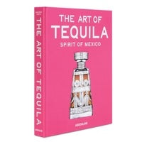 Bright pink hardcover book, The Art of Tequila by Assouline, featuring an illustration of a glass tequila decanter on the cover.