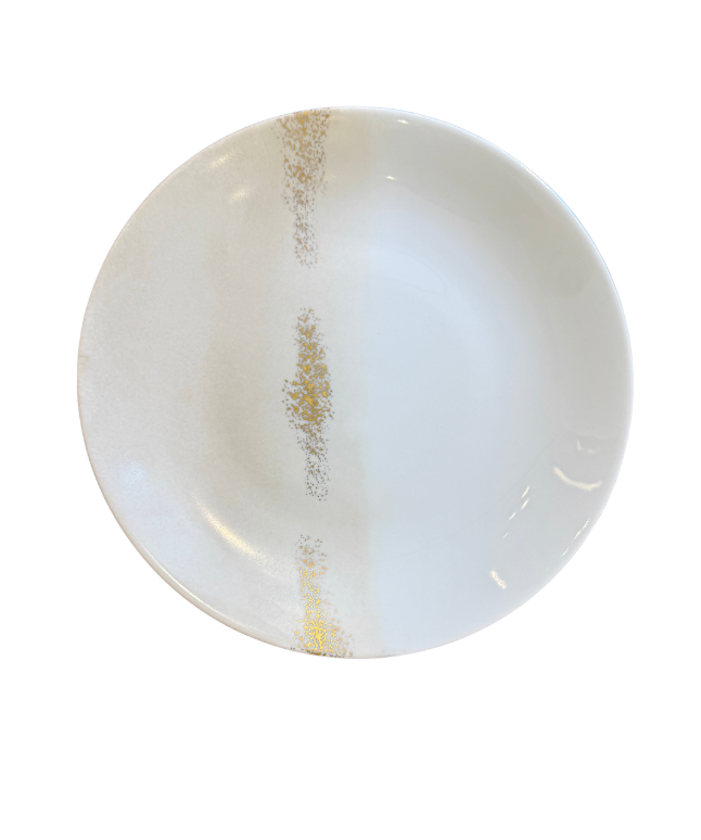 The Marie Daâge Horizon Gold Dinnerware by Marie Daâge is a round white porcelain plate, hand-painted with gold accents forming two irregular vertical lines near the edge, shown on a white background.