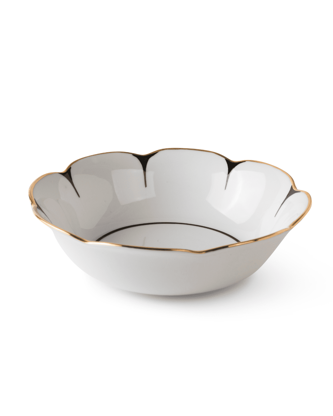 The Drops Dinnerware bowl by Molecot features white Limoges porcelain, a scalloped flower-shaped edge, and a fine gold rim, all showcased against a plain white background.
